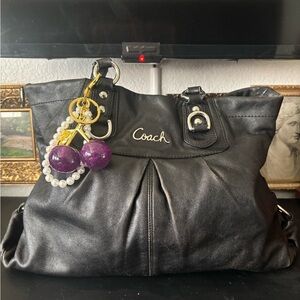 Coach Ashley Black Leather Handbag with Purple Charm Accents and Satin Lining